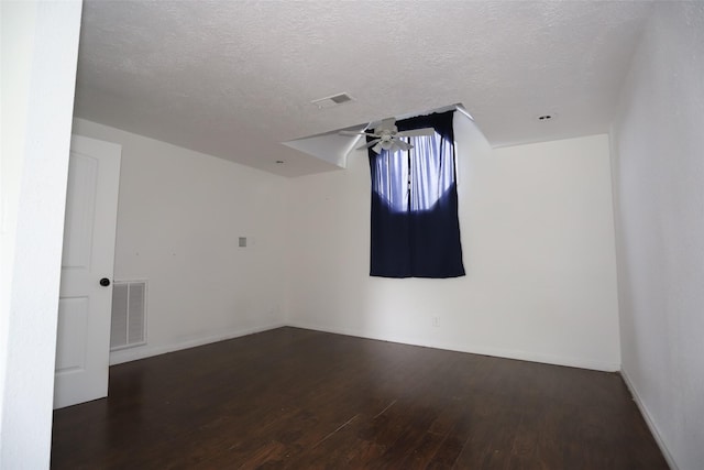 5952 Moonstone St, Port Arthur, TX 77640 - bonus room featuring a ceiling fan, wood finished floors, and a textured ceiling