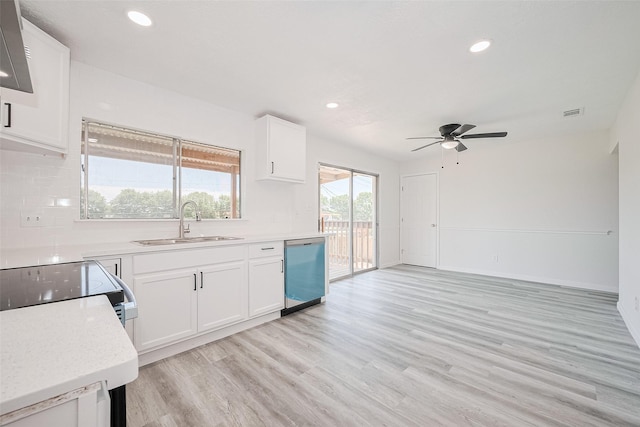 413 E Castle Harbour Dr W, Friendswood, TX 77546 - kitchen with dishwasher, a sink, a ceiling fan, recessed lighting, and white cabinetry