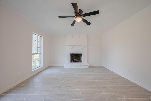 413 E Castle Harbour Dr W, Friendswood, TX 77546 - unfurnished living room with crown molding, a ceiling fan, a fireplace, and baseboards