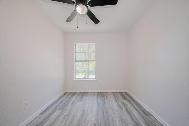 413 E Castle Harbour Dr W, Friendswood, TX 77546 - spare room with light wood-type flooring, baseboards, and ceiling fan