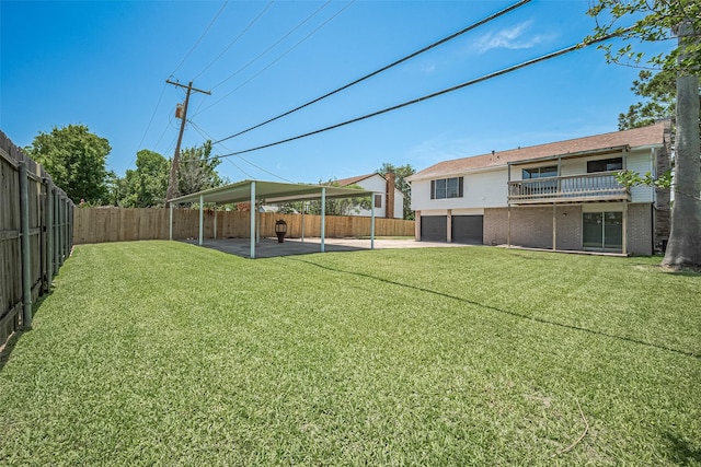 413 E Castle Harbour Dr W, Friendswood, TX 77546 - view of yard featuring a patio, a balcony, and a garage