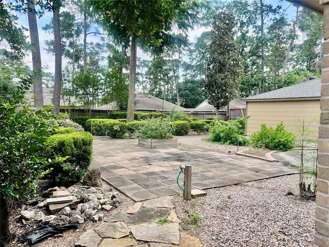 6523 Coral Ridge Rd, Houston, TX 77069 - fenced backyard with a patio area