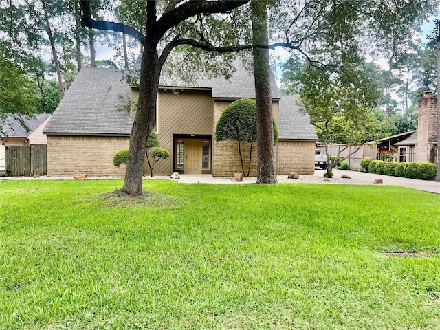 6523 Coral Ridge Rd, Houston, TX 77069 - mid-century inspired home with brick siding and a shingled roof