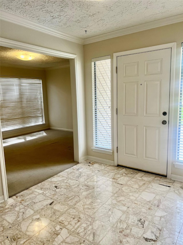 6523 Coral Ridge Rd, Houston, TX 77069 - entrance foyer with baseboards, crown molding, and a textured ceiling