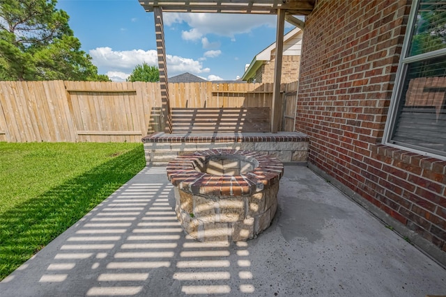14727 Bronze Finch Dr, Cypress, TX 77433 - fenced backyard with a fire pit and a patio area