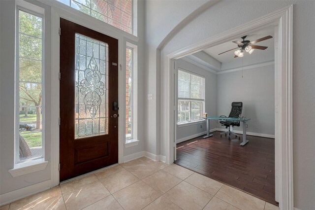 14727 Bronze Finch Dr, Cypress, TX 77433 - tiled entryway with baseboards and a ceiling fan