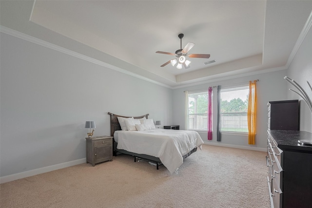 14727 Bronze Finch Dr, Cypress, TX 77433 - bedroom with a tray ceiling, light colored carpet, baseboards, and crown molding