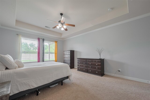14727 Bronze Finch Dr, Cypress, TX 77433 - bedroom with a tray ceiling, light carpet, crown molding, ceiling fan, and baseboards