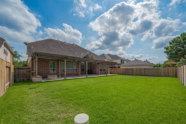 14727 Bronze Finch Dr, Cypress, TX 77433 - back of house featuring ceiling fan, a patio area, and brick siding