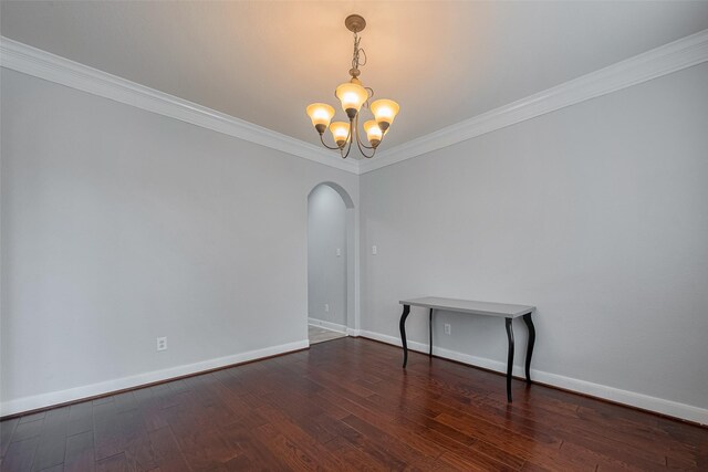 14727 Bronze Finch Dr, Cypress, TX 77433 - unfurnished room with arched walkways, a chandelier, dark wood-style floors, and ornamental molding