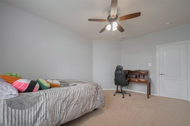 14727 Bronze Finch Dr, Cypress, TX 77433 - bedroom with carpet flooring, baseboards, and a ceiling fan
