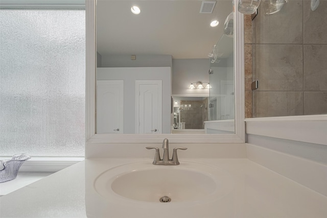 14727 Bronze Finch Dr, Cypress, TX 77433 - bathroom featuring vanity and recessed lighting