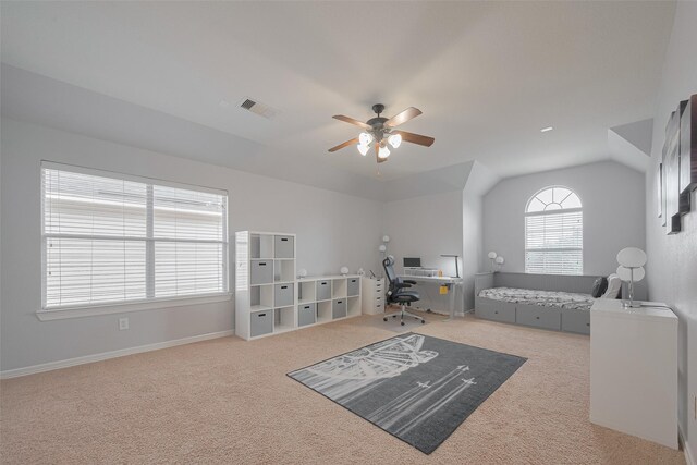 14727 Bronze Finch Dr, Cypress, TX 77433 - carpeted bedroom featuring an office area, vaulted ceiling, a ceiling fan, and baseboards