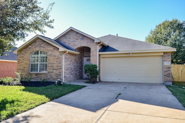 15111 Crescent Lilly Dr, Cypress, TX 77433 - view of front of property featuring brick siding, driveway, a garage, and roof with shingles
