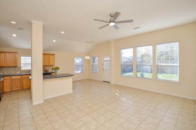 15111 Crescent Lilly Dr, Cypress, TX 77433 - unfurnished living room featuring a ceiling fan, lofted ceiling, light tile patterned floors, recessed lighting, and baseboards