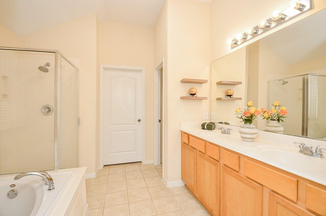 15111 Crescent Lilly Dr, Cypress, TX 77433 - full bathroom featuring a shower stall, tile patterned flooring, double vanity, and a bath