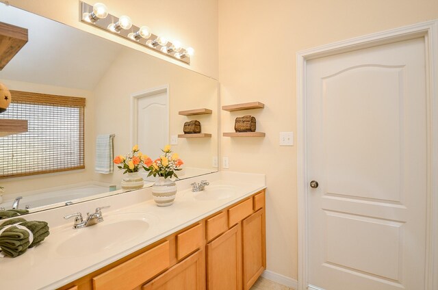 15111 Crescent Lilly Dr, Cypress, TX 77433 - bathroom featuring double vanity and a bath