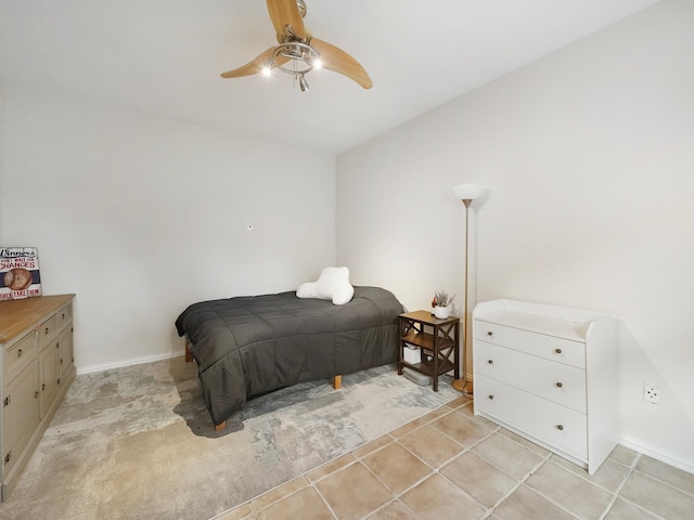 7106 Harmony Cv, Houston, TX 77036 - bedroom with a ceiling fan and baseboards