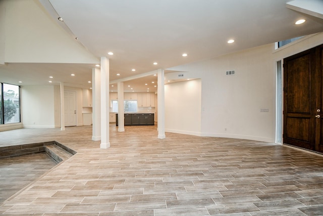 8115 Fondren Lake Dr, Houston, TX 77071 - unfurnished living room featuring recessed lighting, baseboards, and light wood-type flooring