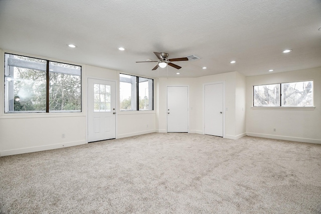 8115 Fondren Lake Dr, Houston, TX 77071 - unfurnished bedroom with light colored carpet, recessed lighting, multiple closets, and baseboards