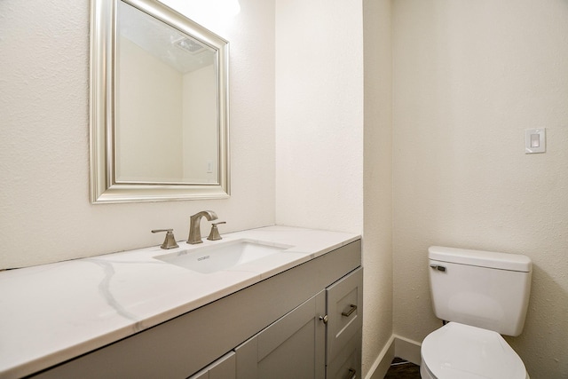 8115 Fondren Lake Dr, Houston, TX 77071 - half bath featuring vanity, toilet, and baseboards