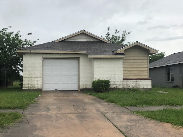 4619 Croker Ridge Rd, Houston, TX 77053 - view of front of house featuring a shingled roof, brick siding, an attached garage, and driveway