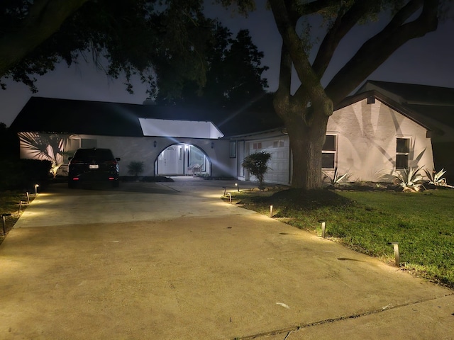3311 Oyster Cove Dr, Missouri City, TX 77459 - view of front of home featuring concrete driveway and stucco siding