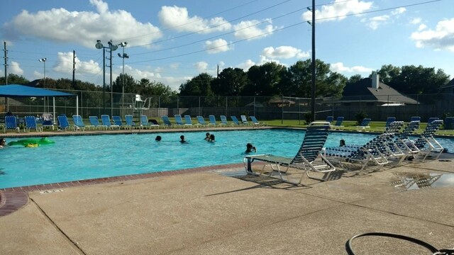 21406 Park Post Ln, Katy, TX 77450 - community pool with a patio
