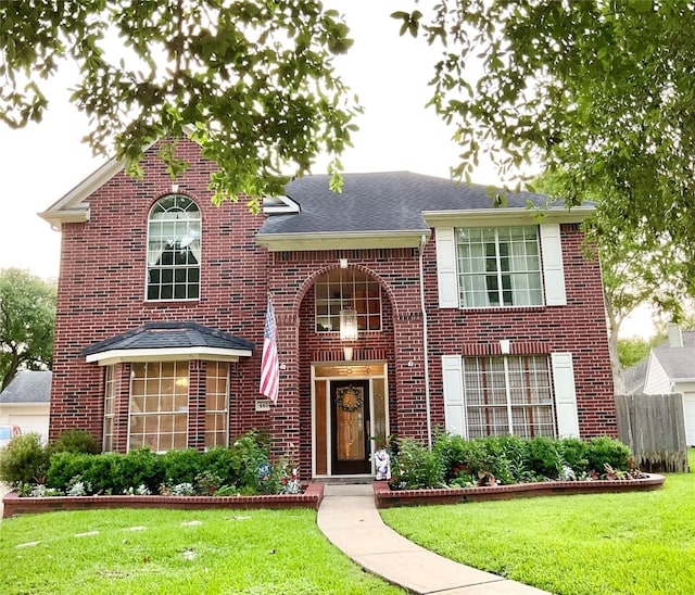 4406 Plantation Creek Dr, Missouri City, TX 77459 - view of front facade with brick siding and a shingled roof