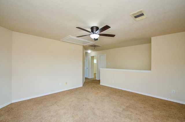 13108 Southern Way Ln, Pearland, TX 77584 - empty room with attic access, a ceiling fan, light carpet, and baseboards