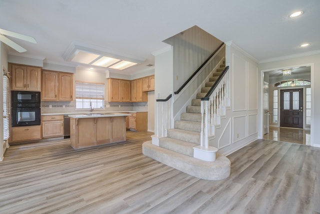 4226 Roaring Rapids Dr, Houston, TX 77059 - kitchen featuring black appliances, light countertops, light wood-style flooring, ornamental molding, and ceiling fan
