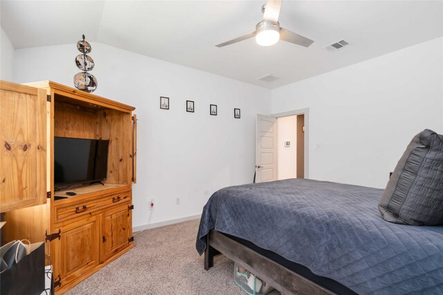 7730 Robert Ln, Rosharon, TX 77583 - bedroom with light carpet, vaulted ceiling, ceiling fan, and baseboards