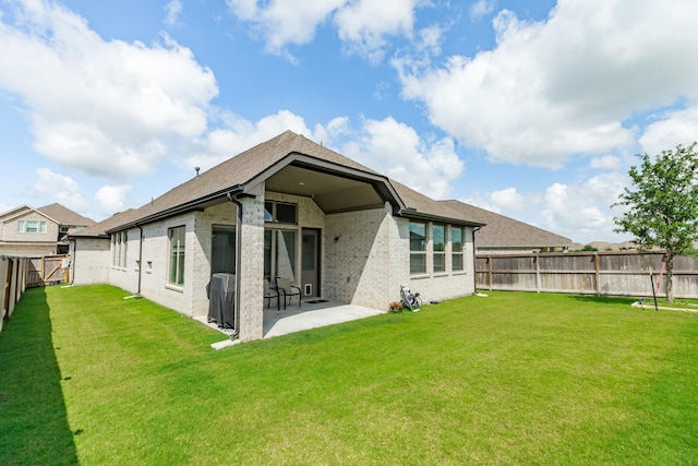 5007 Country Meadows Trl, Rosharon, TX 77583 - back of house featuring a patio and brick siding
