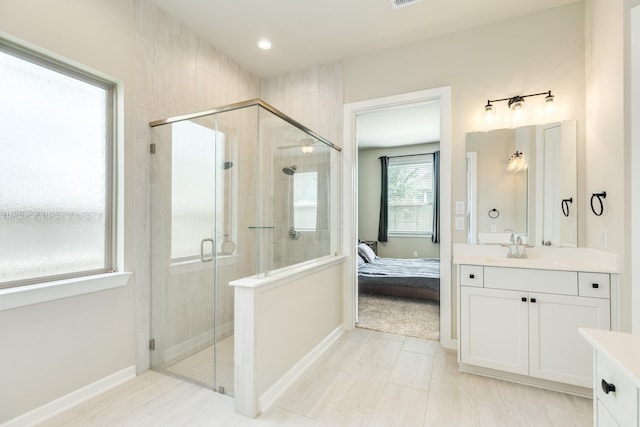 5007 Country Meadows Trl, Rosharon, TX 77583 - ensuite bathroom featuring vanity, a shower stall, and baseboards