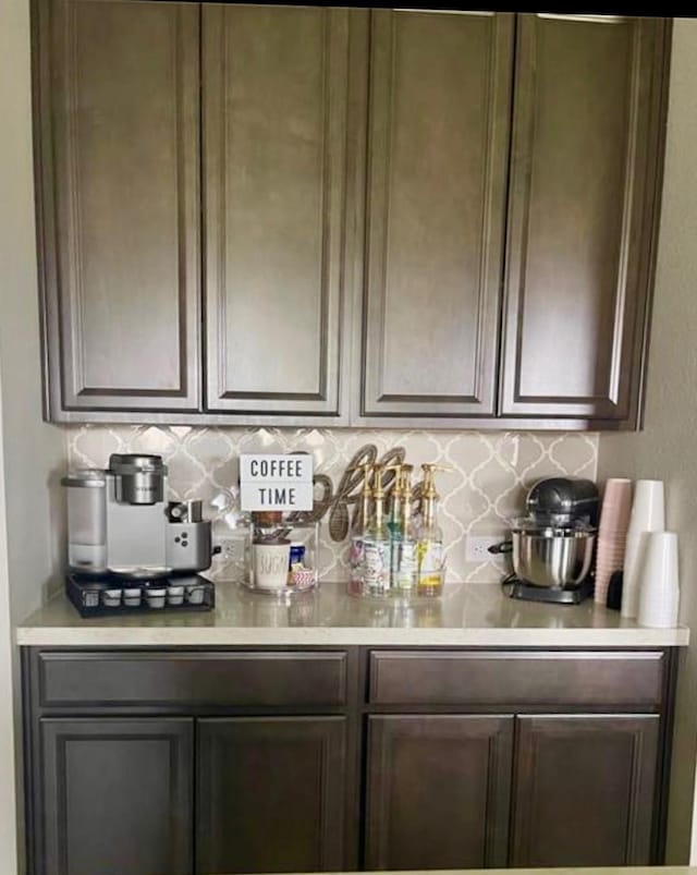 7638 Sirocco Ln, Baytown, TX 77523 - indoor dry bar with decorative backsplash