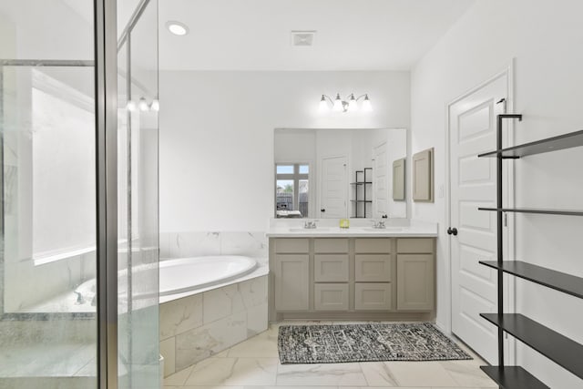 23014 Blackstone Park Rd, Katy, TX 77493 - bathroom with double vanity, a bath, marble finish flooring, and a stall shower