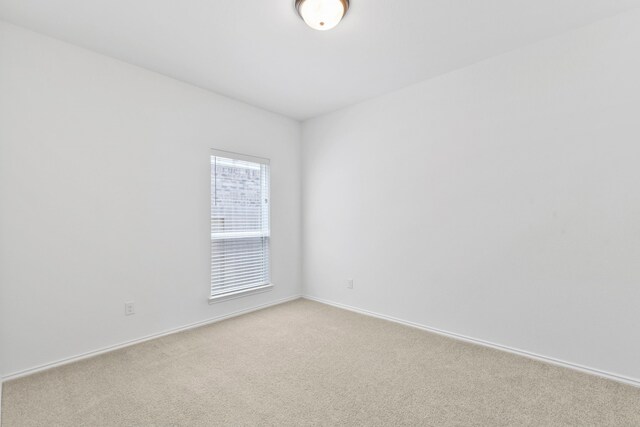 23014 Blackstone Park Rd, Katy, TX 77493 - spare room with light carpet and baseboards