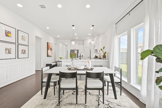 23014 Blackstone Park Rd, Katy, TX 77493 - dining room featuring wood finished floors, plenty of natural light, and recessed lighting