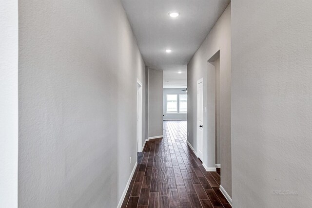 2410 Blazing Star Dr, Brookshire, TX 77423 - corridor featuring dark wood-style floors, baseboards, and recessed lighting
