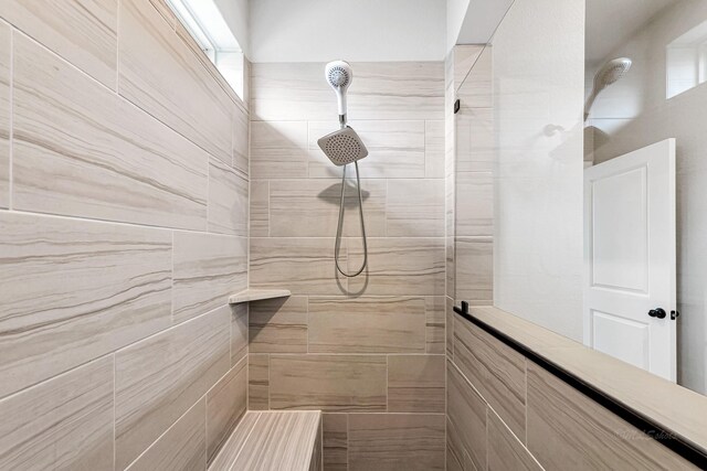 2410 Blazing Star Dr, Brookshire, TX 77423 - bathroom featuring tiled shower