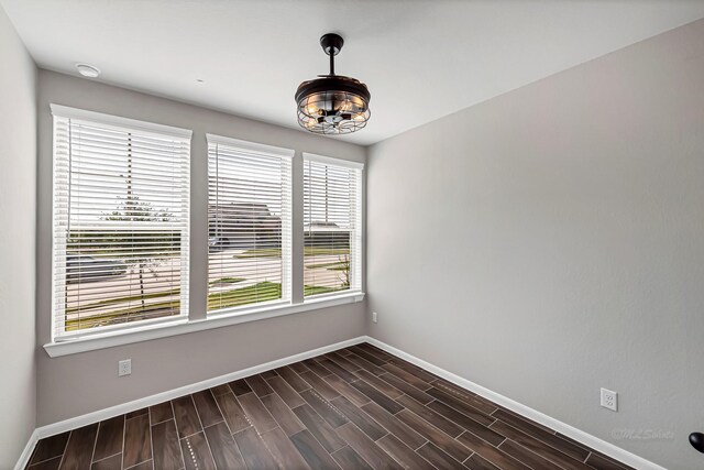 2410 Blazing Star Dr, Brookshire, TX 77423 - empty room featuring baseboards and dark wood-type flooring