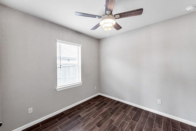 2410 Blazing Star Dr, Brookshire, TX 77423 - empty room featuring baseboards, a ceiling fan, and dark wood-style flooring
