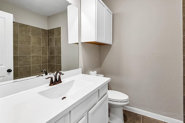 2410 Blazing Star Dr, Brookshire, TX 77423 - bathroom with toilet, vanity, and baseboards