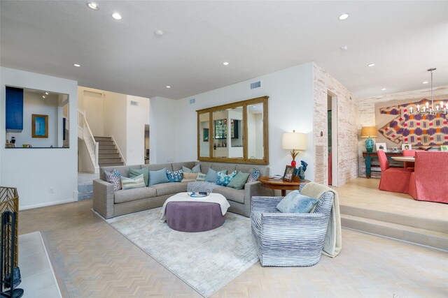 88 Sugarberry Cir, Houston, TX 77024 - living area featuring stairs, baseboards, recessed lighting, and a chandelier