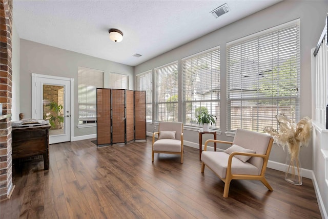 259 W Thorn Way, Houston, TX 77015 - living area featuring dark wood-style flooring and baseboards
