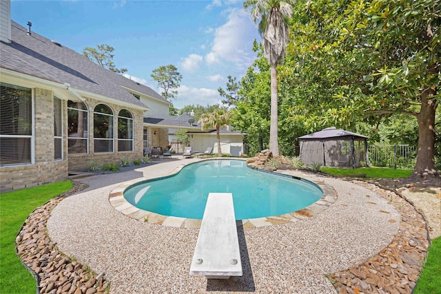 259 W Thorn Way, Houston, TX 77015 - view of swimming pool with a gazebo, a diving board, and a patio