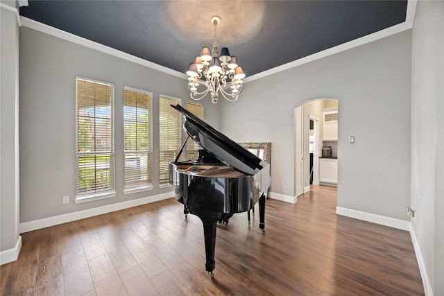 259 W Thorn Way, Houston, TX 77015 - living area featuring arched walkways, baseboards, ornamental molding, dark wood finished floors, and a chandelier
