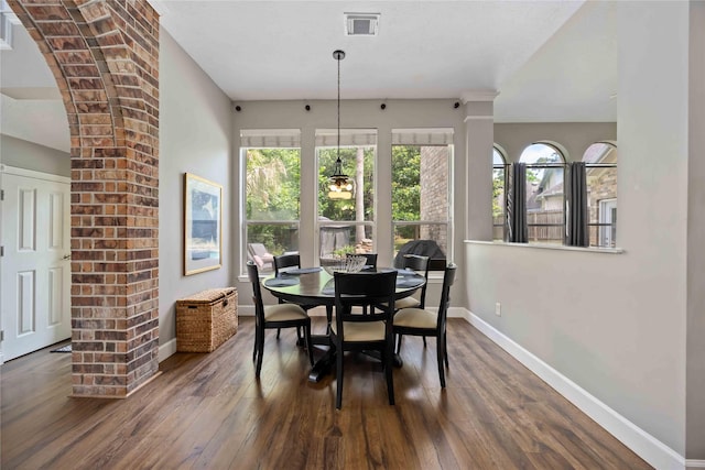 259 W Thorn Way, Houston, TX 77015 - dining area featuring baseboards and dark wood-style floors