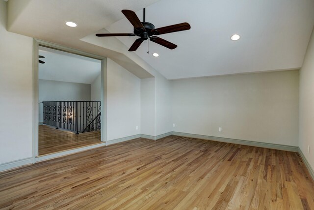 2466 Beacon Cir, League City, TX 77573 - empty room with wood finished floors, recessed lighting, a ceiling fan, baseboards, and lofted ceiling