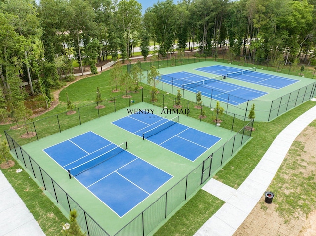 21514 Lost Valley Ln, Porter, TX 77365 - view of tennis court featuring view of scattered trees